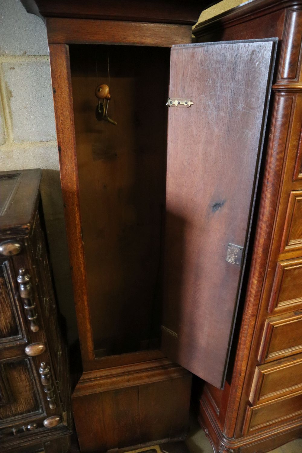 A George III oak eight day longcase clock, the square brass dial marked Brice of Sandwich, height 210cm